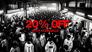 "Busy Korean street market with shoppers in monochrome, highlighted 20% OFF promotion.